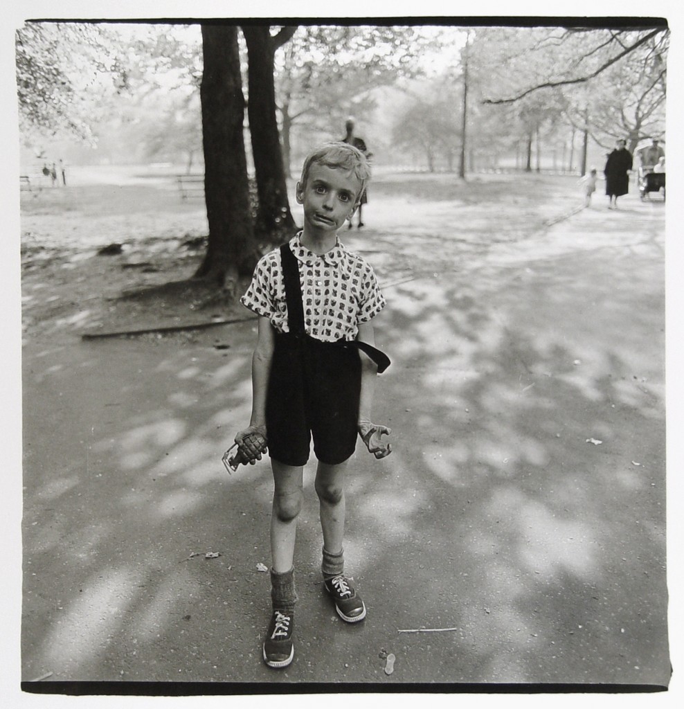 Child with a toy hand grenade in Central Park, N.Y.C. 1962